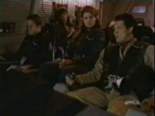 Trace being questioned in the shuttle