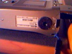 bottom, the black thing is a tripod mount