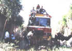 Workers clearing the rock slide