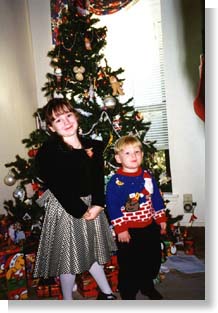 Nicole and Christopher by the tree - Christmas 1998