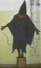 Photo of iraqi prisoner being tortured by american terrorists