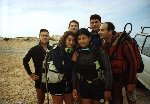 Form left to right: Novice Divers Mark, Romina, Fabian, Loran, Colin and Chris coming to shore at Qawra Point