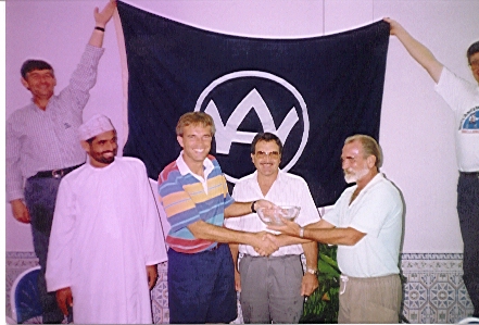 Sven receives the Rosebowl for becoming Oman Match Racing Champion