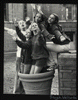 Some friends clowning around in a planter