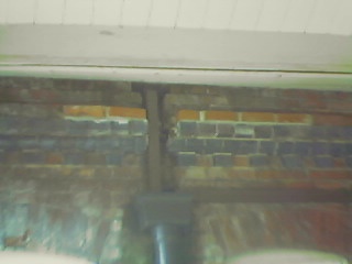 `Brickwork repaired around downpipe 10-Mar-2000