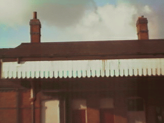 Odd length chimneys on station building.