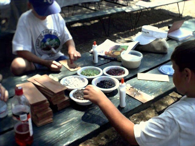 Bears working on their mosaics