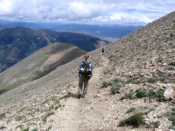 Victoria trundling down the upper slopes of Mt Belford after a long day.